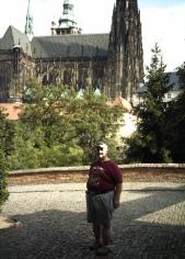 Near the Castle of Prague, standing in front of the Cathedral of Prague, in Czech Republic.