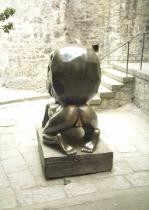 Rear view of a very intriguing statue near the Castle of Prague, in Czech Republic.